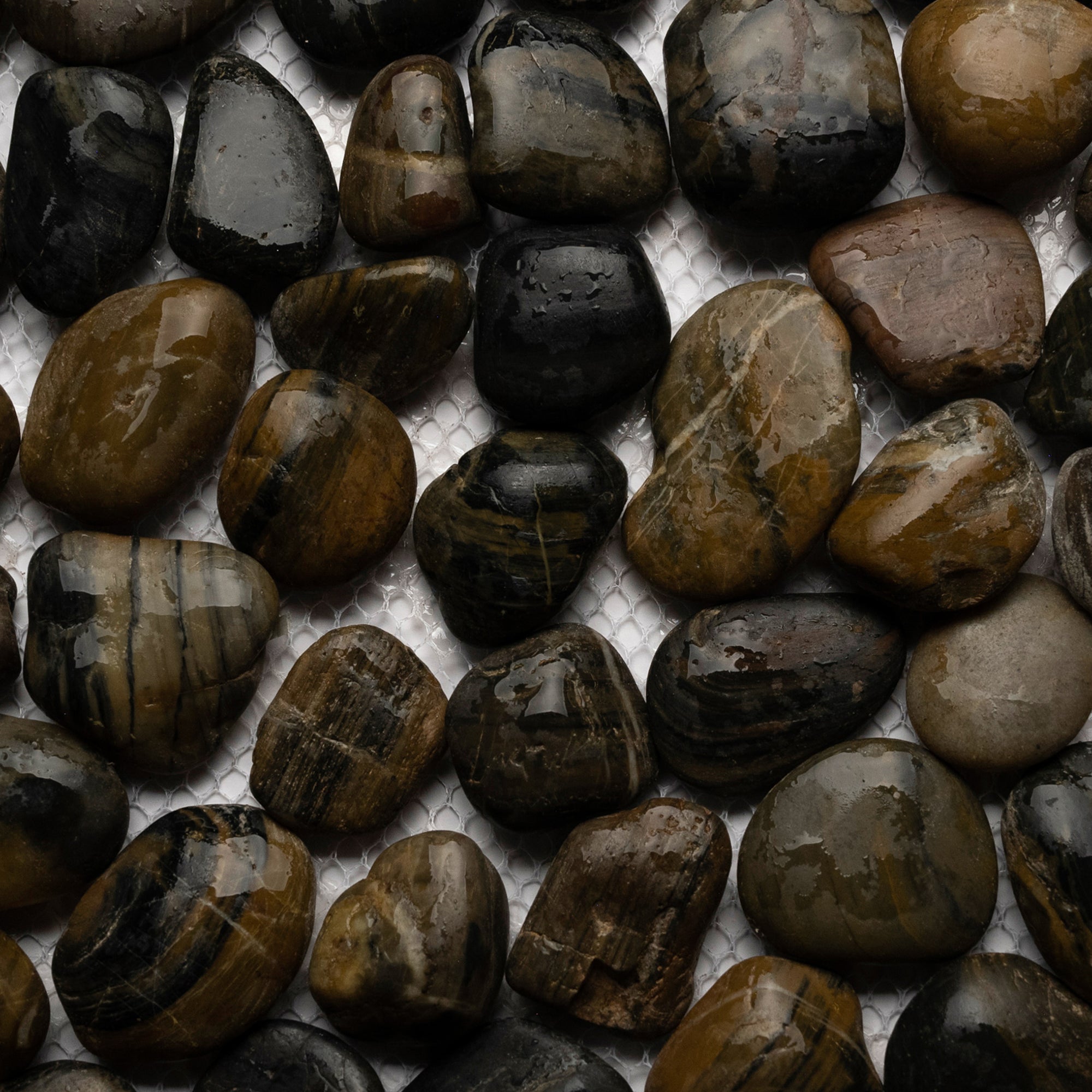 Transform Your Space with Stunning Polished Tiger Eye Pebble Tiles