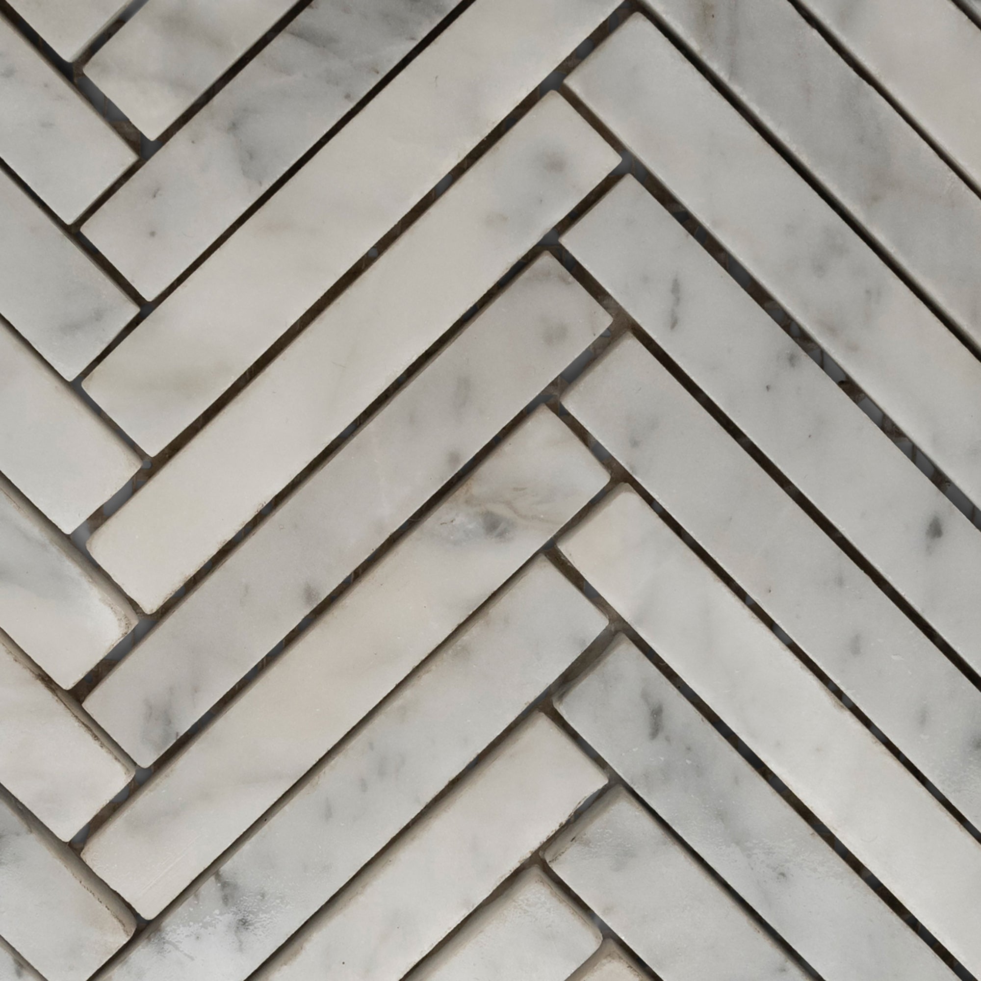 Transform Your Space with Luxurious Carrara Chevron Mosaic Tiles!