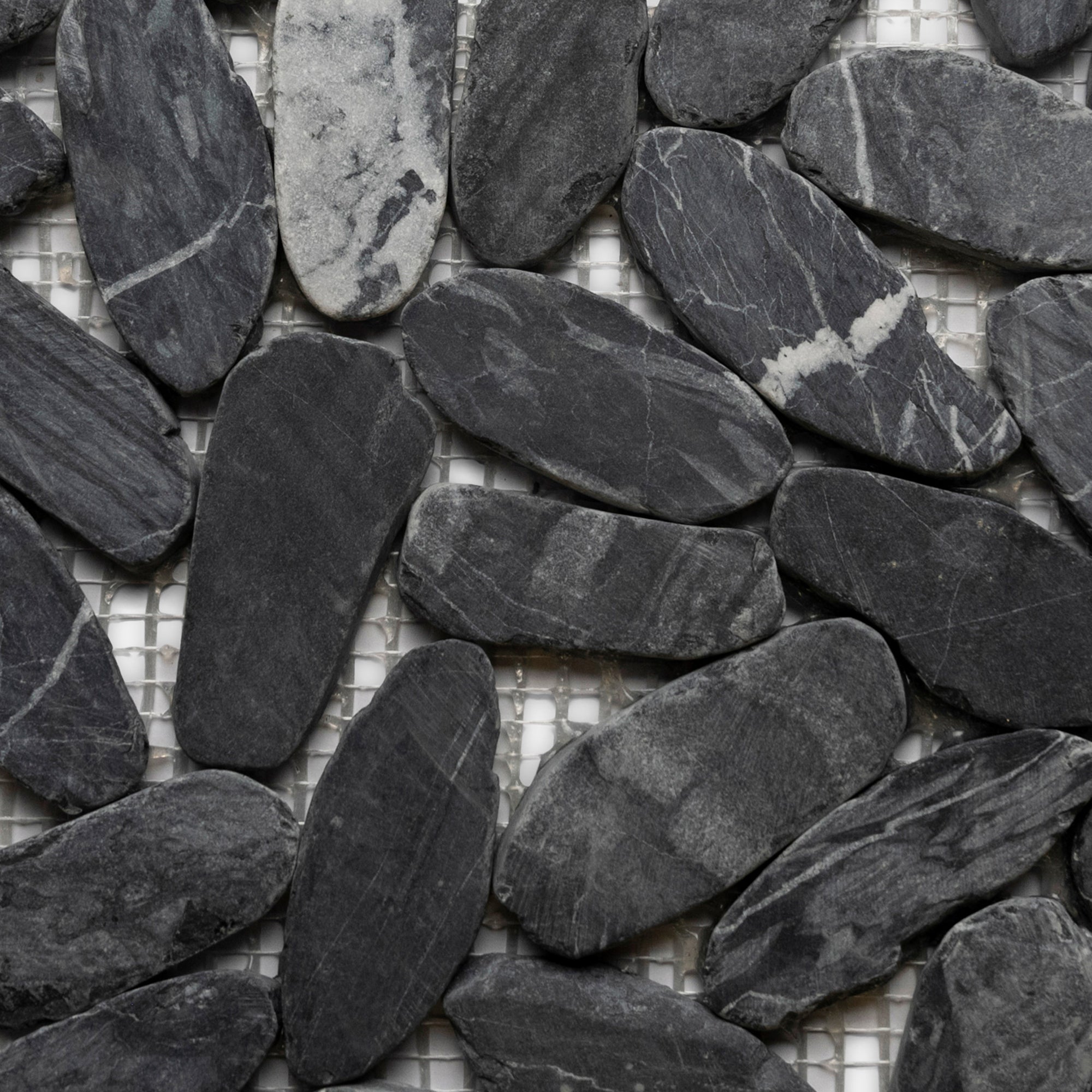 Tempest Black Elegance: Exquisite Oval Pebble Tiles for Your Dream Space!