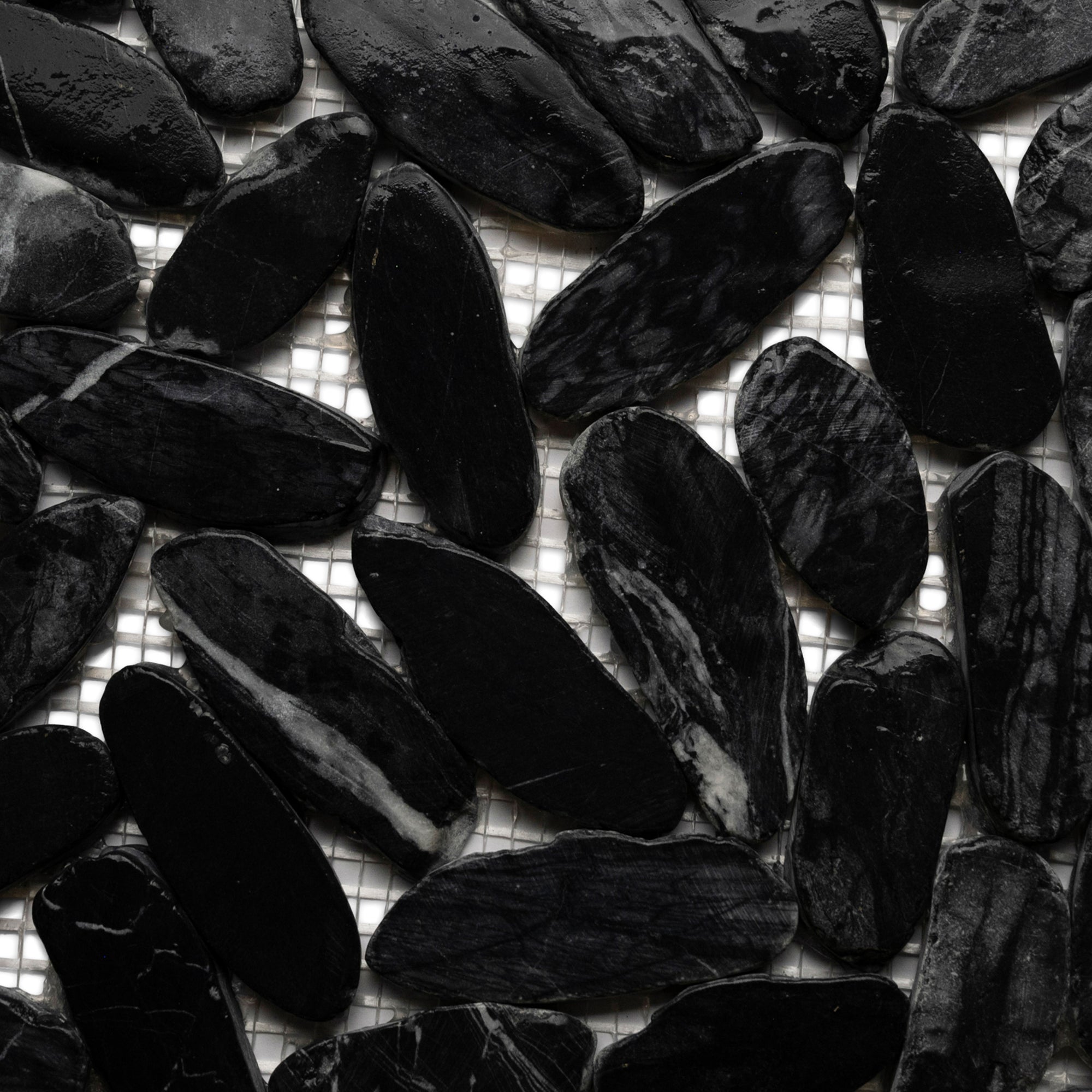 Tempest Black Elegance: Exquisite Oval Pebble Tiles for Your Dream Space!